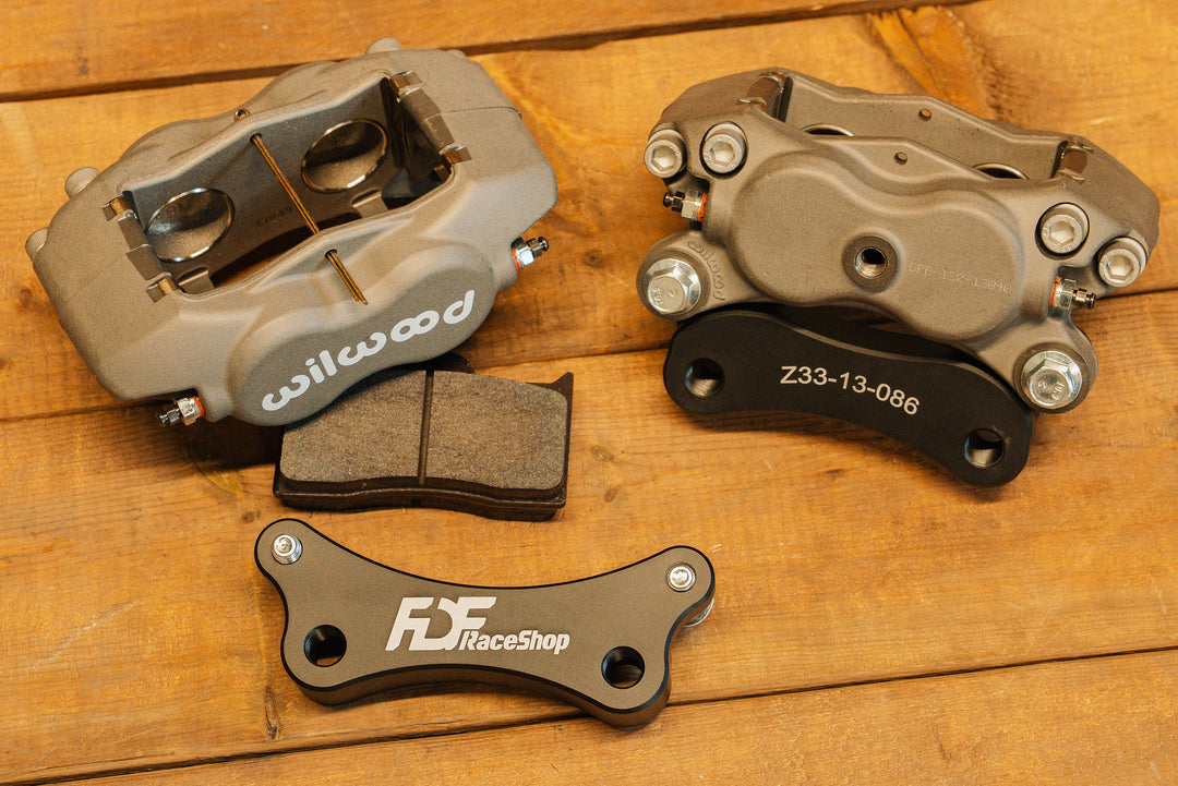 Nissan 350Z Wilwood Front Caliper Bracket assembled on the right