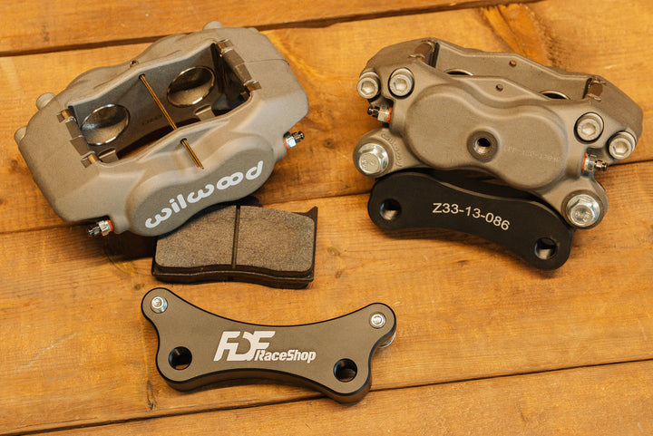 Nissan 350Z Wilwood Front Caliper Bracket assembled on the right