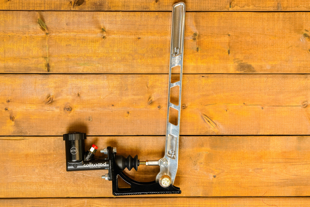 raw aluminum and engraved handbrake with reservoir