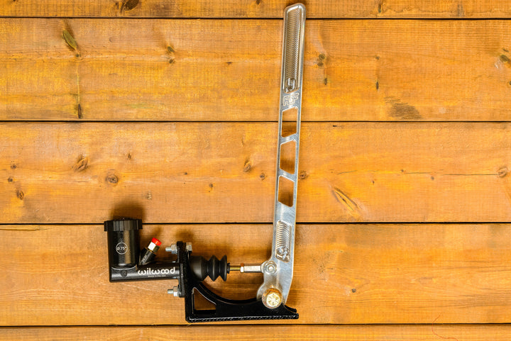 raw aluminum and engraved handbrake with reservoir
