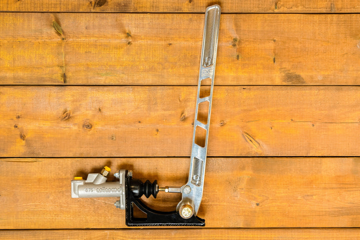 raw aluminum and engraved handbrake with inline reservoir