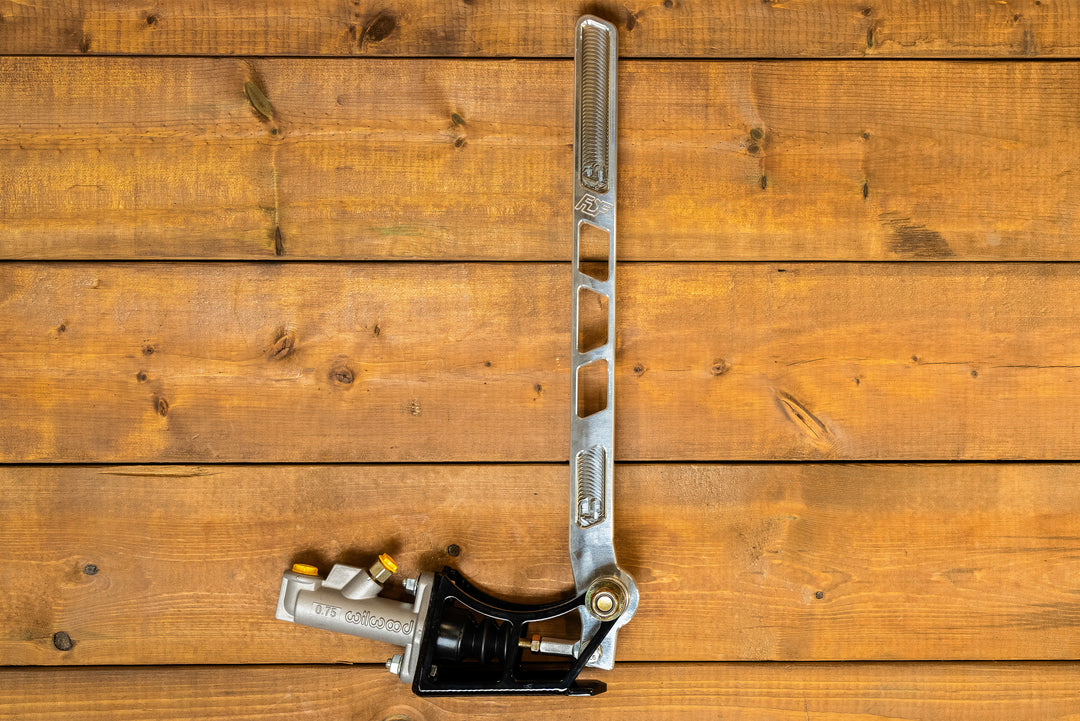 Raw aluminum handbrake on wooden display