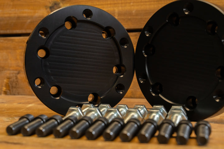 close up of hardware with anodized black quick change axle adaptors